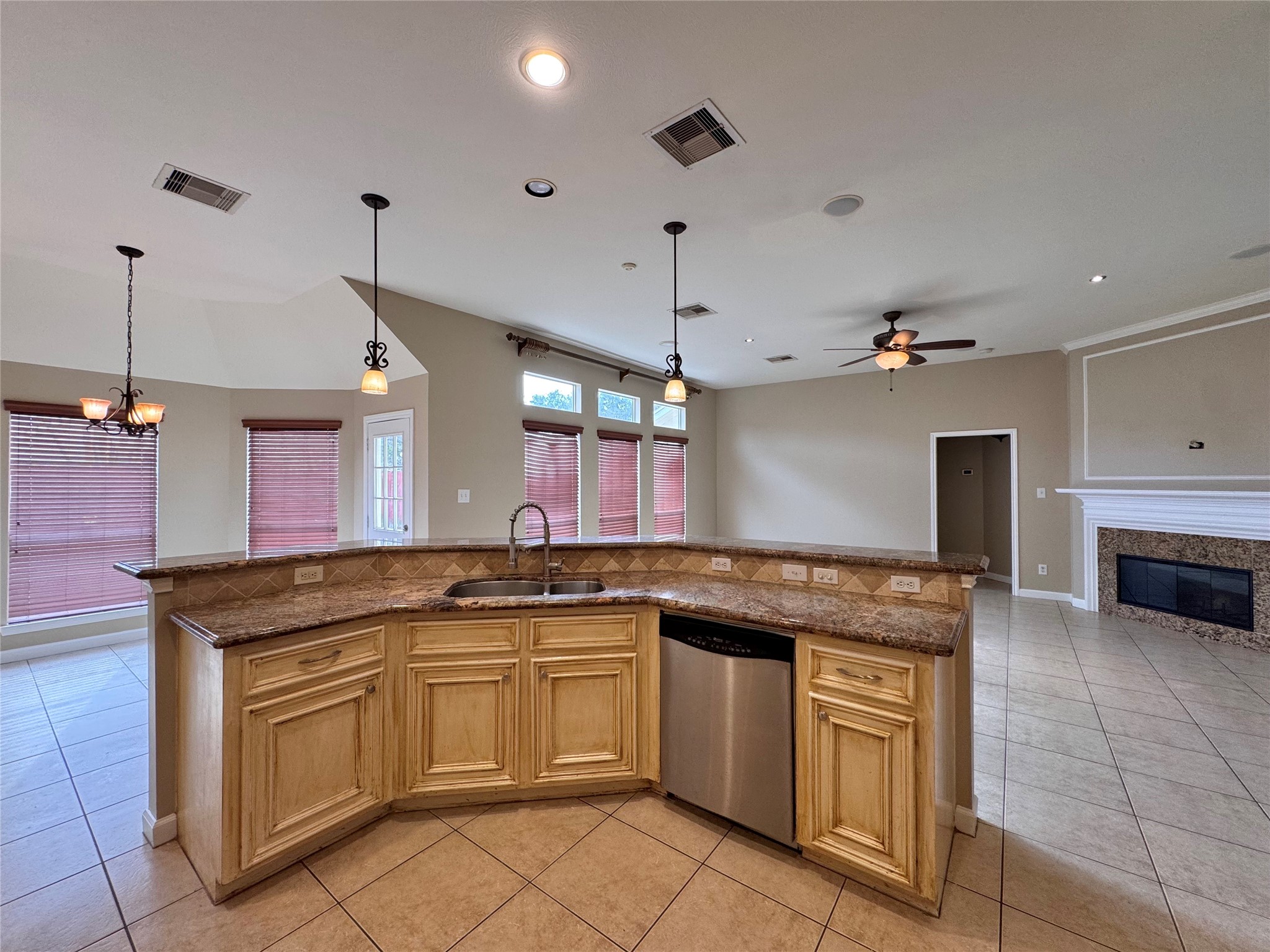 17243 Rush Trace Court Houston, TX 77095 - Photo 16 of 49 a kitchen with a sink stove and cabinets