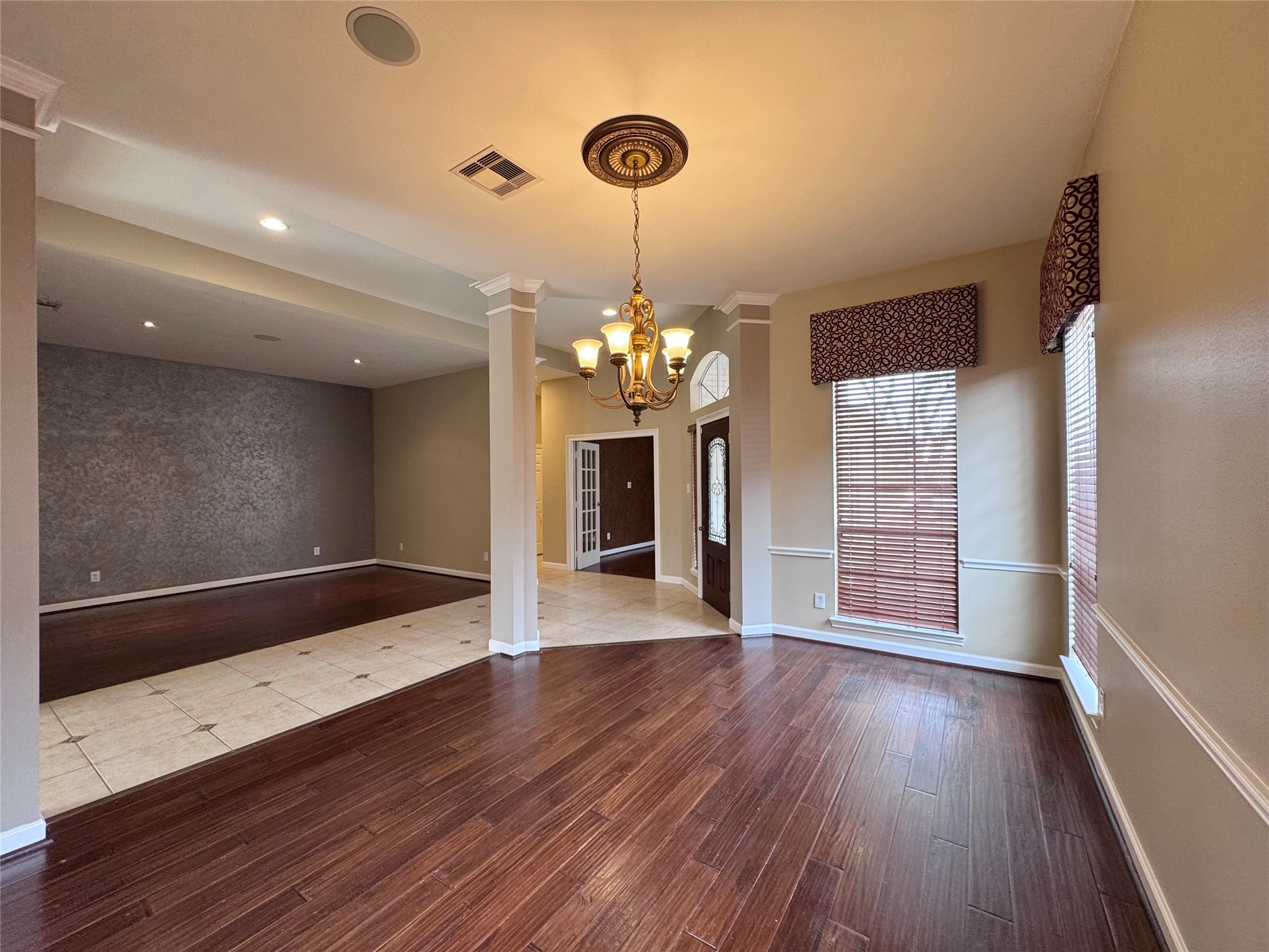 17243 Rush Trace Court Houston, TX 77095 - Photo 20 of 49 a view of an empty room with wooden floor and a window