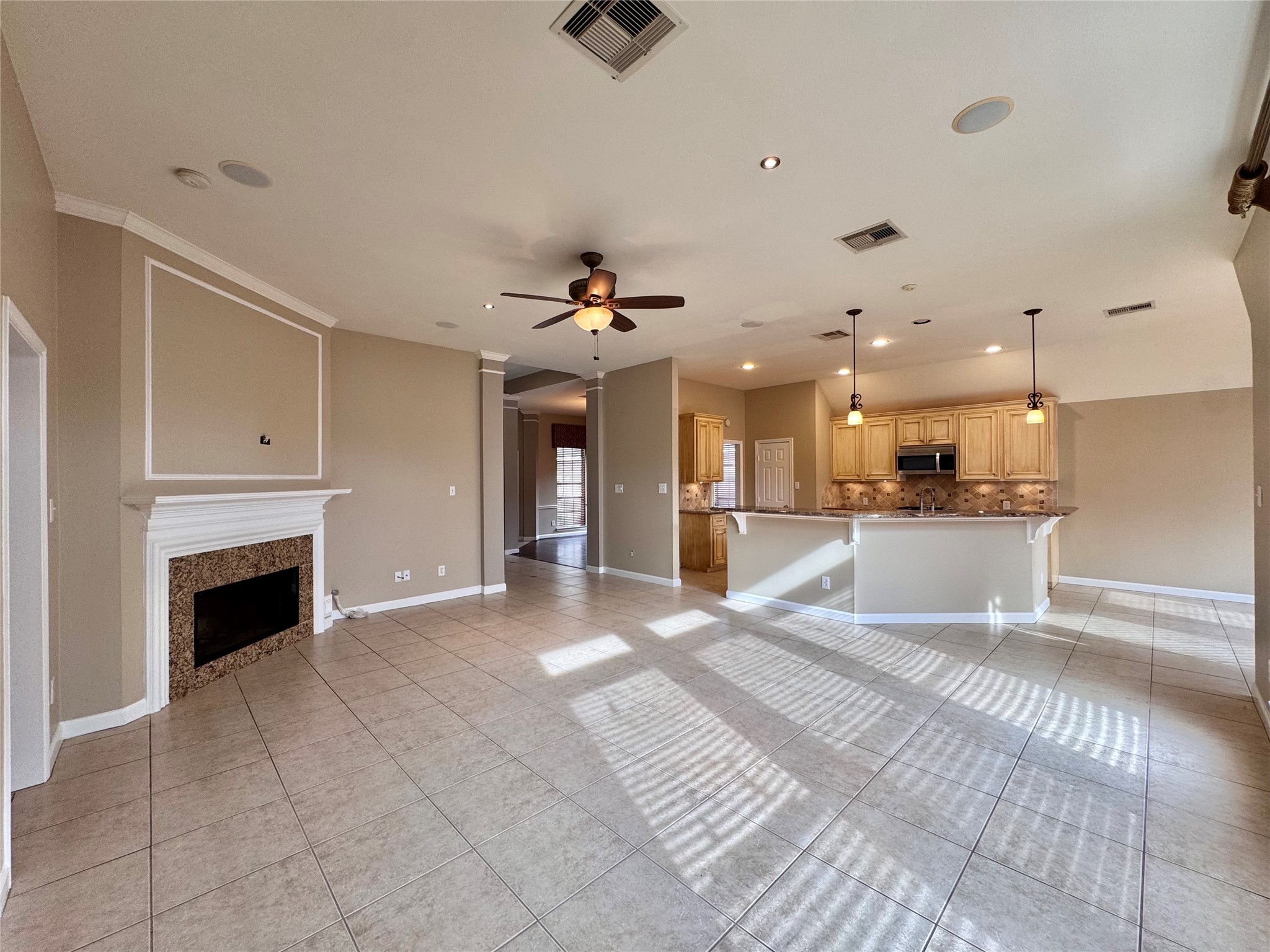 17243 Rush Trace Court Houston, TX 77095 - Photo 25 of 49 a view of an empty room and kitchen view