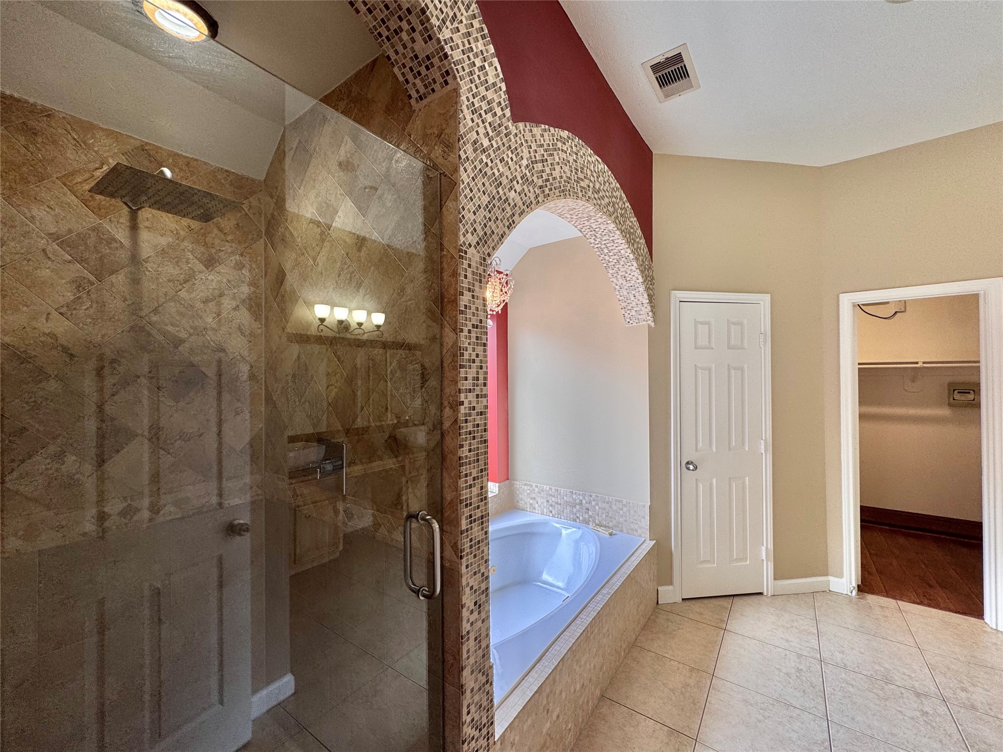 17243 Rush Trace Court Houston, TX 77095 - Photo 29 of 49 a en suite bathroom with a tub shower and sink
