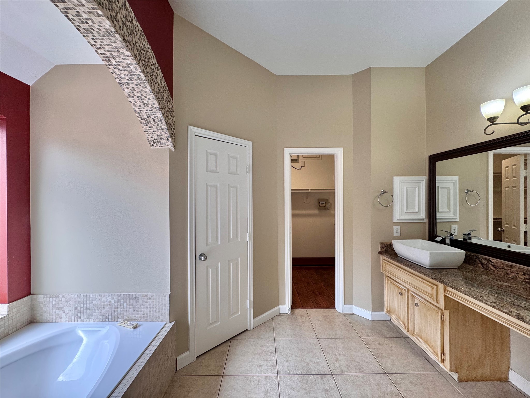 17243 Rush Trace Court Houston, TX 77095 - Photo 32 of 49 a large bathroom with a granite countertop tub shower and sink