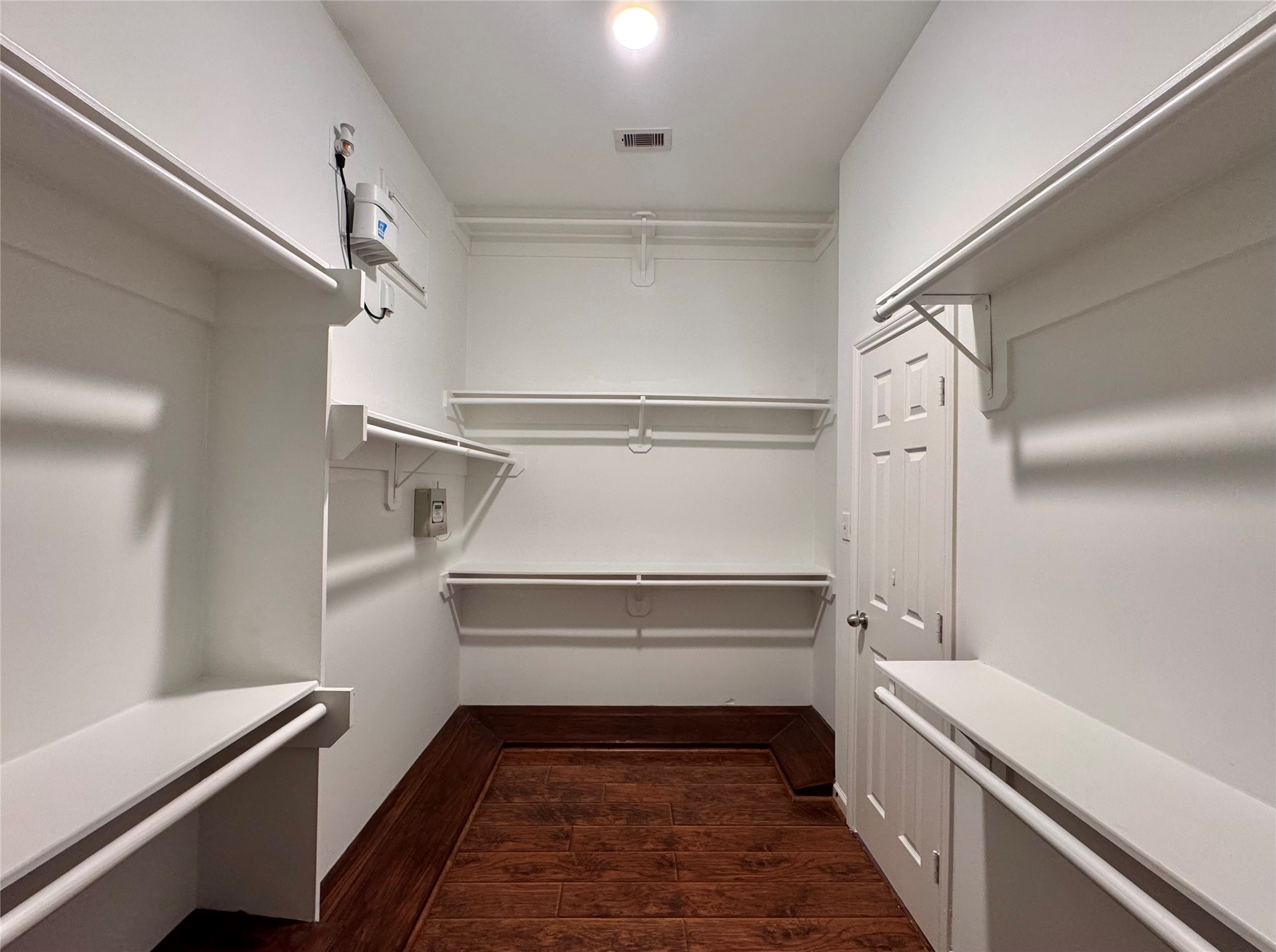 17243 Rush Trace Court Houston, TX 77095 - Photo 34 of 49 a view of closet with wooden floor