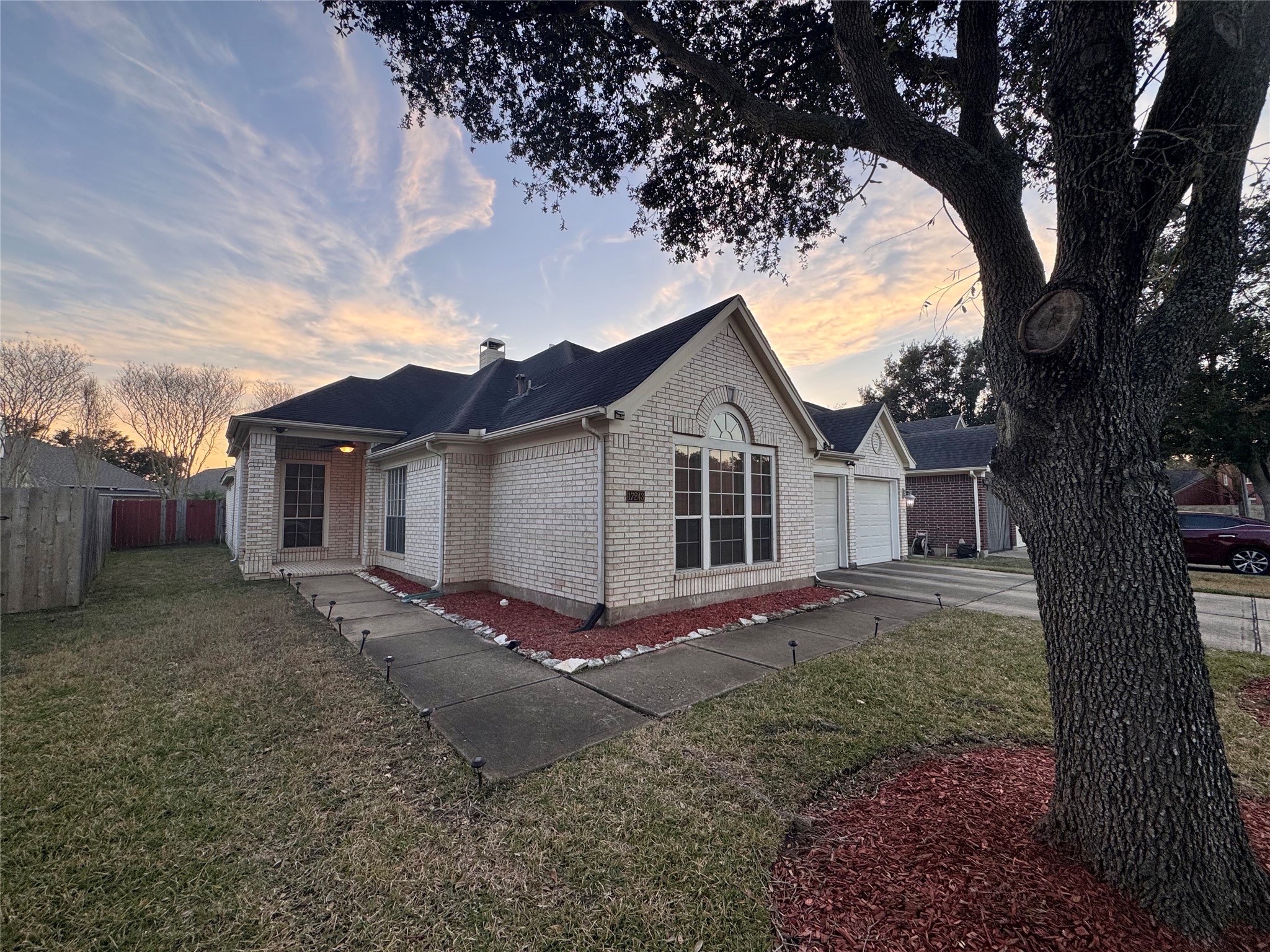 17243 Rush Trace Court Houston, TX 77095 - Photo 4 of 49 a view of house with a yard