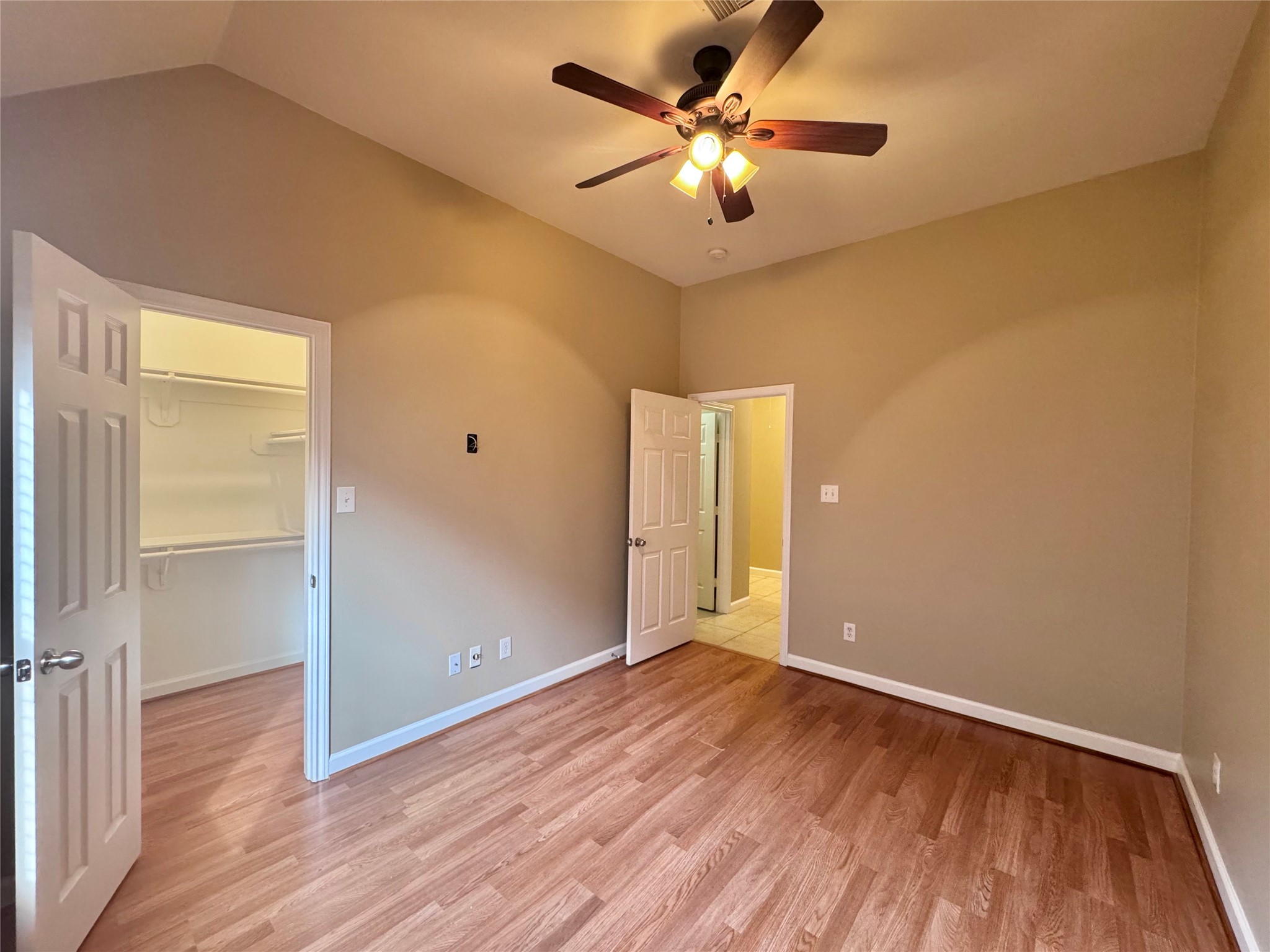 17243 Rush Trace Court Houston, TX 77095 - Photo 46 of 49 a view of an empty room with wooden floor
