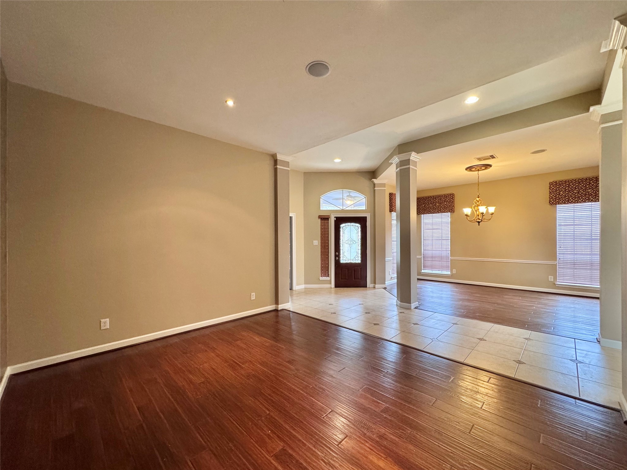17243 Rush Trace Court Houston, TX 77095 - Photo 47 of 49 a view of an empty room with wooden floor