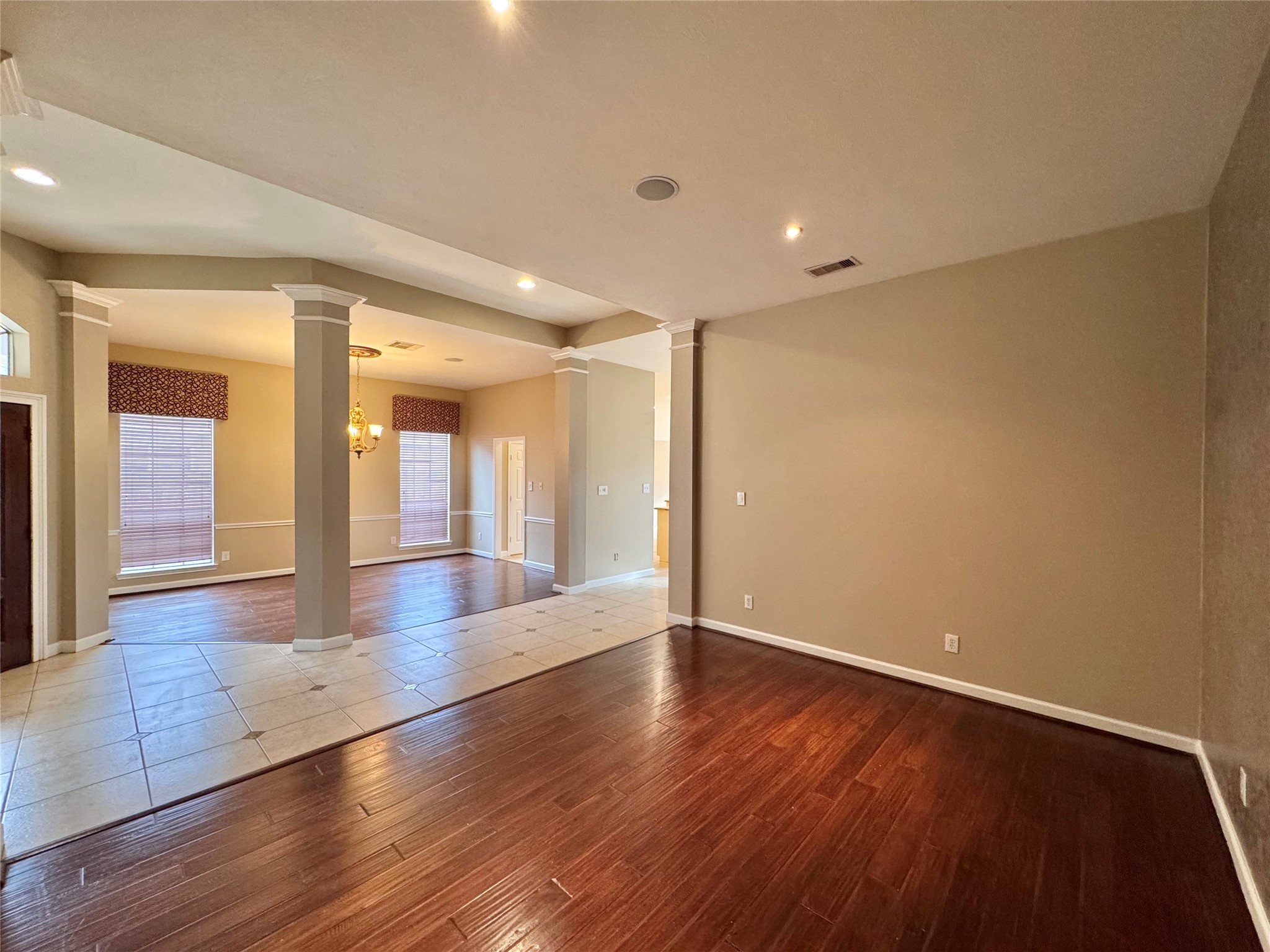 17243 Rush Trace Court Houston, TX 77095 - Photo 48 of 49 a view of an empty room with wooden floor