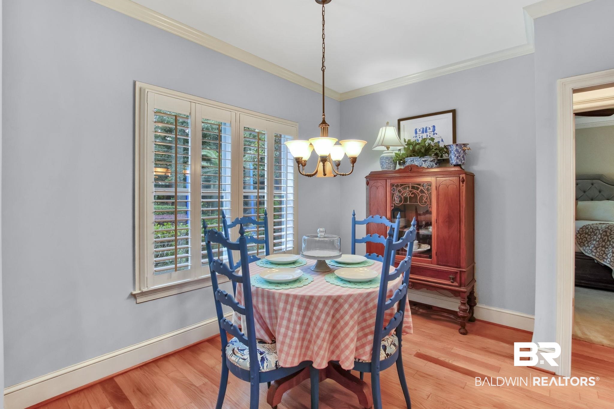 9478 Autauga Bend Daphne, AL 36526 - Photo 51 of 73 Dining area featuring plenty of natural light, light hardwood / wood-style flooring, and an inviting chandelier