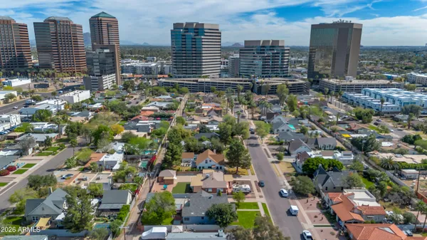 an aerial view of a city with lots of buildings