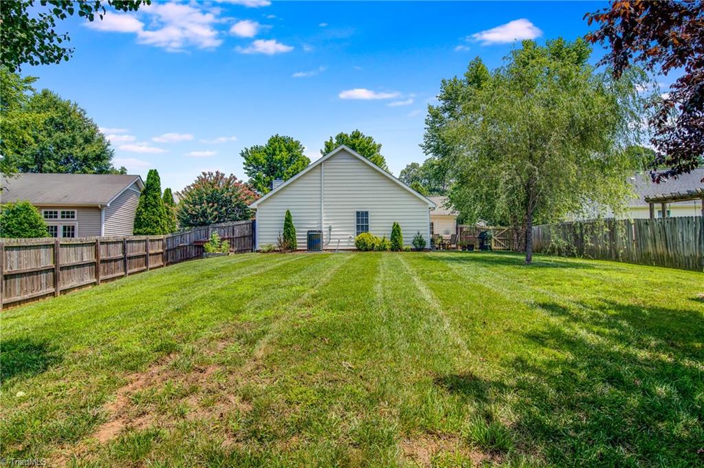5605 Broadleaf Road Summerfield, NC 27358 - Photo 26 of 27 Extra large backyard.
