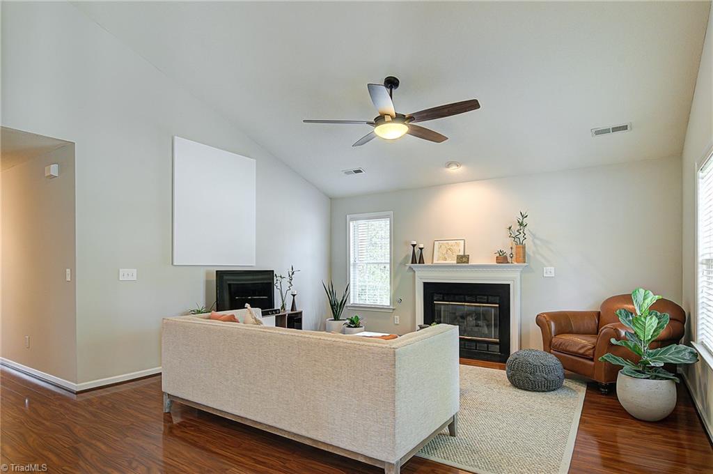 5605 Broadleaf Road Summerfield, NC 27358 - Photo 5 of 27 Open living, dining, and kitchen spaces.