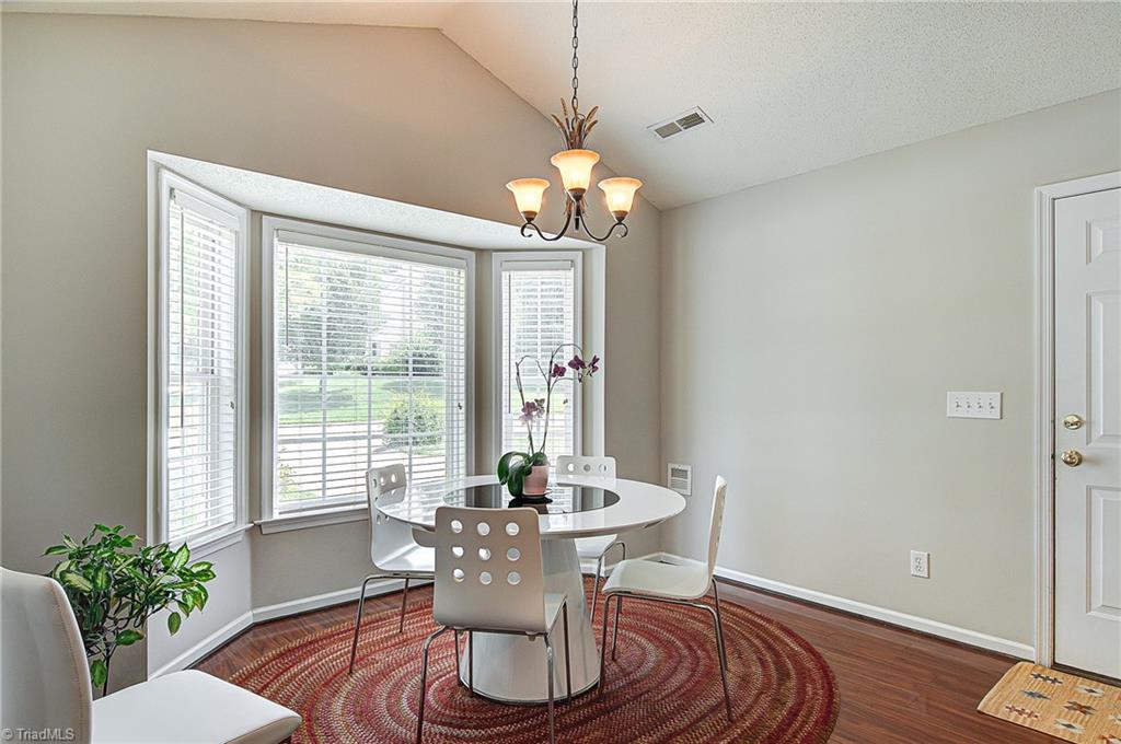 5605 Broadleaf Road Summerfield, NC 27358 - Photo 9 of 27 Tons of natural light in this dining nook.