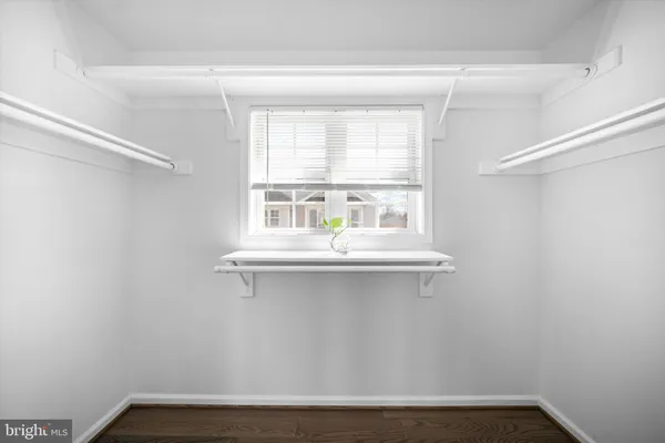a bathroom with a sink and a window