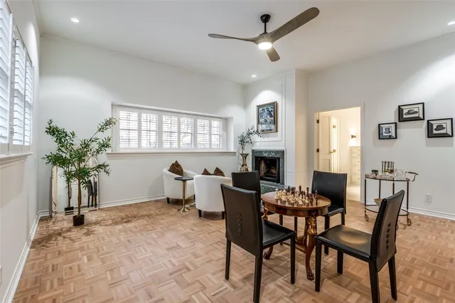 a dining room with furniture and window