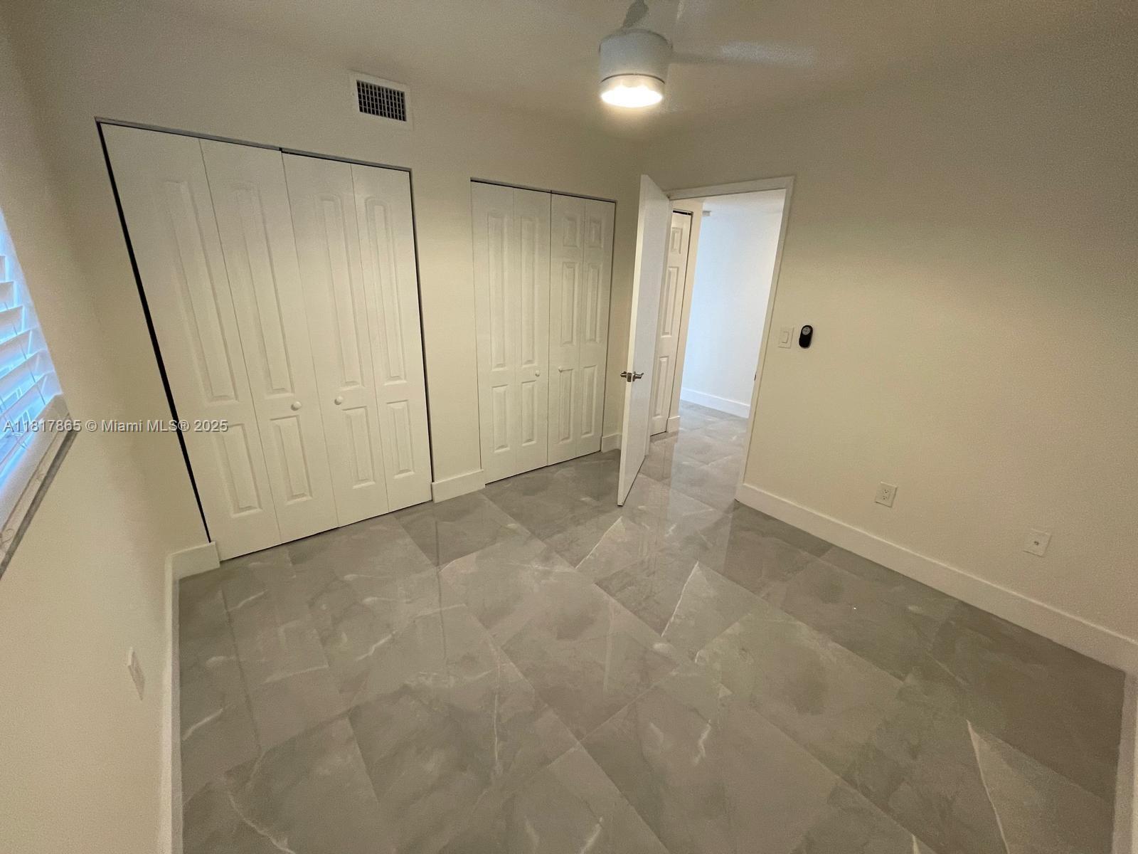 14921 Southwest 82nd Lane, Unit 19508 Miami, FL 33193 - Photo 13 of 31 a view of an empty room