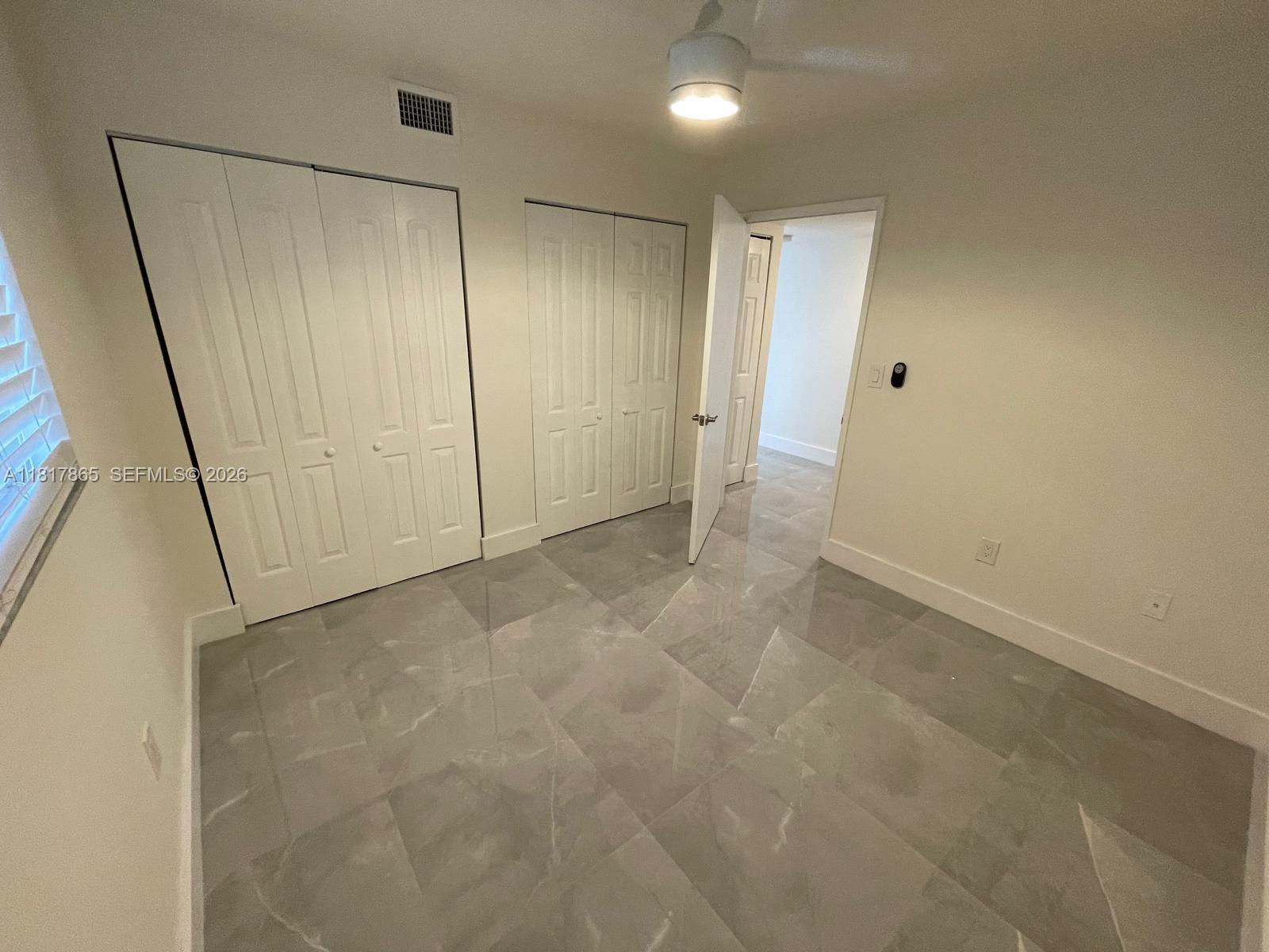 14921 Southwest 82nd Lane, Unit 19508 Miami, FL 33193 - Photo 14 of 31 a view of an empty room