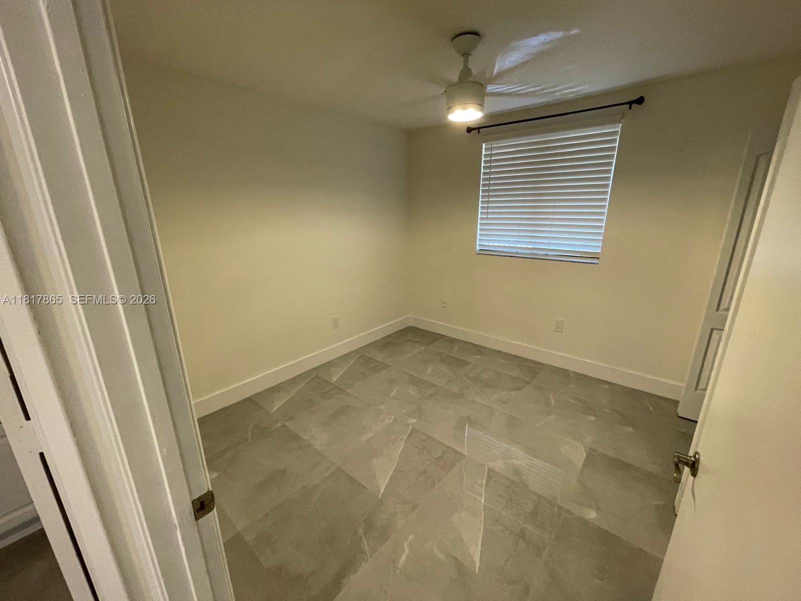 14921 Southwest 82nd Lane, Unit 19508 Miami, FL 33193 - Photo 15 of 31 a view of a room with a window