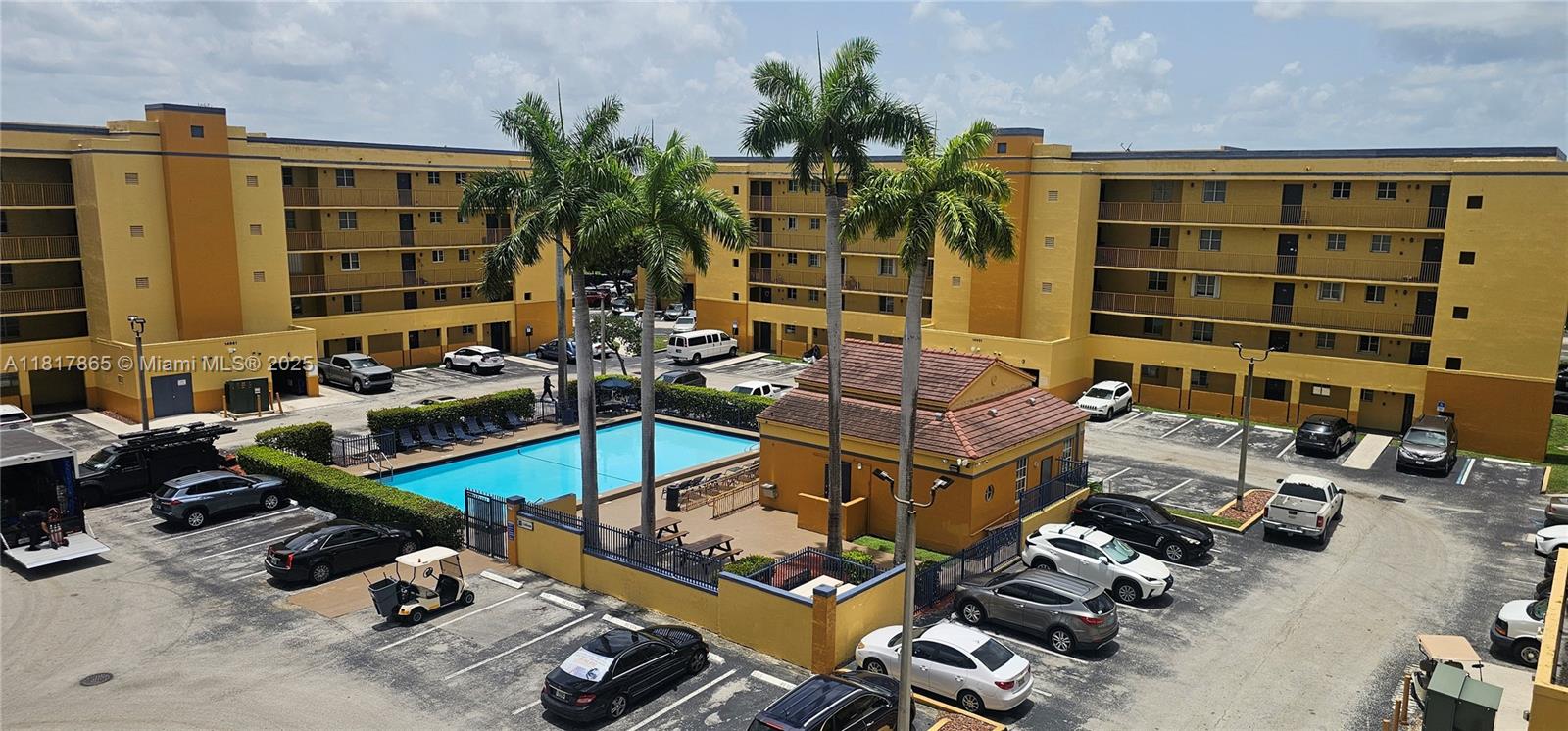 14921 Southwest 82nd Lane, Unit 19508 Miami, FL 33193 - Photo 21 of 31 an aerial view of a house with swimming pool and porch
