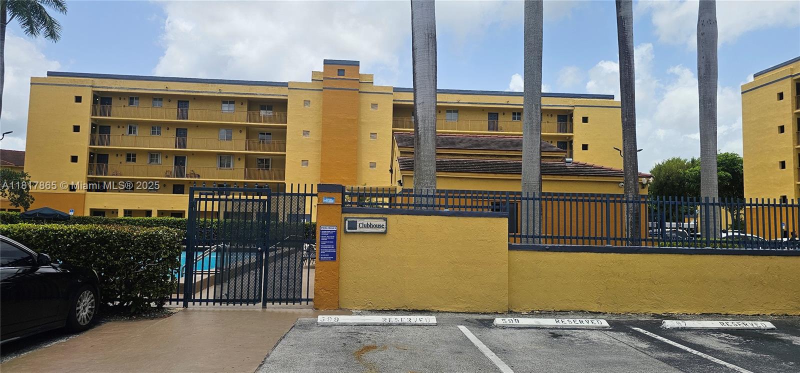14921 Southwest 82nd Lane, Unit 19508 Miami, FL 33193 - Photo 22 of 31 a front view of a building with glass windows