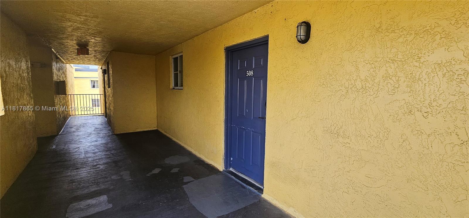14921 Southwest 82nd Lane, Unit 19508 Miami, FL 33193 - Photo 25 of 31 a view of a hallway with wooden floor