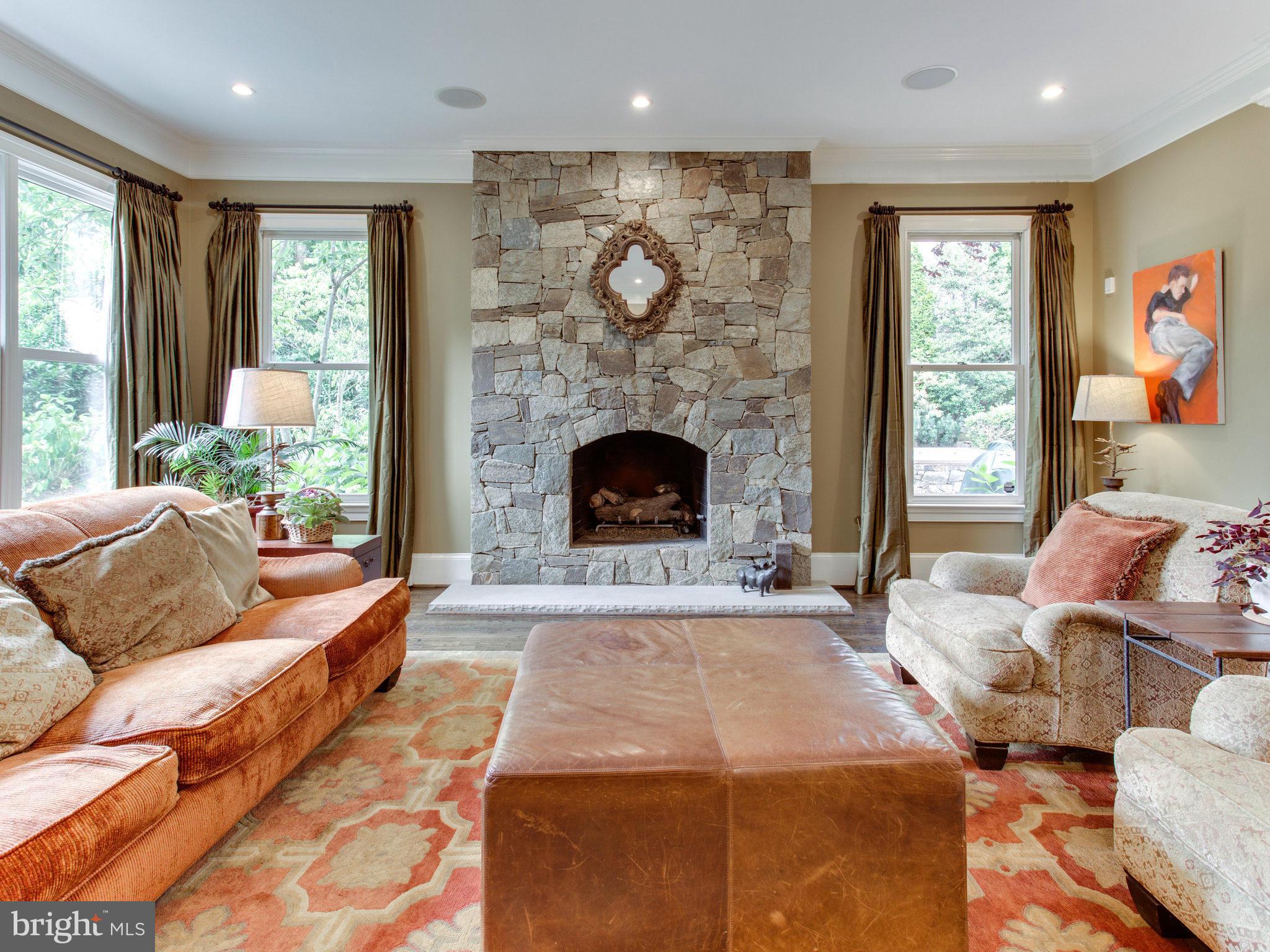 1338 Kirby Road McLean, VA 22101 - Photo 14 of 30 a living room with furniture and a fireplace