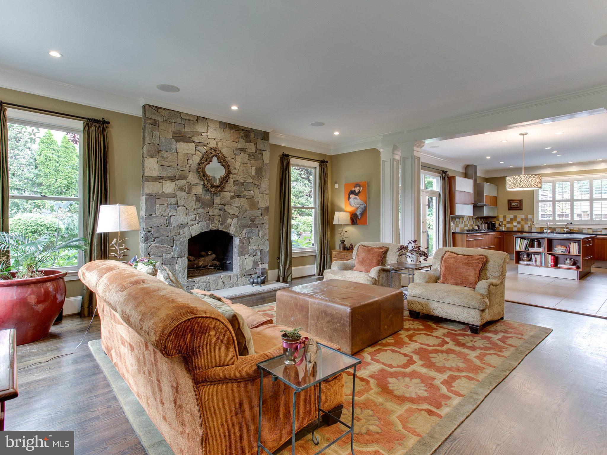 1338 Kirby Road McLean, VA 22101 - Photo 16 of 30 a living room with furniture fireplace and a table