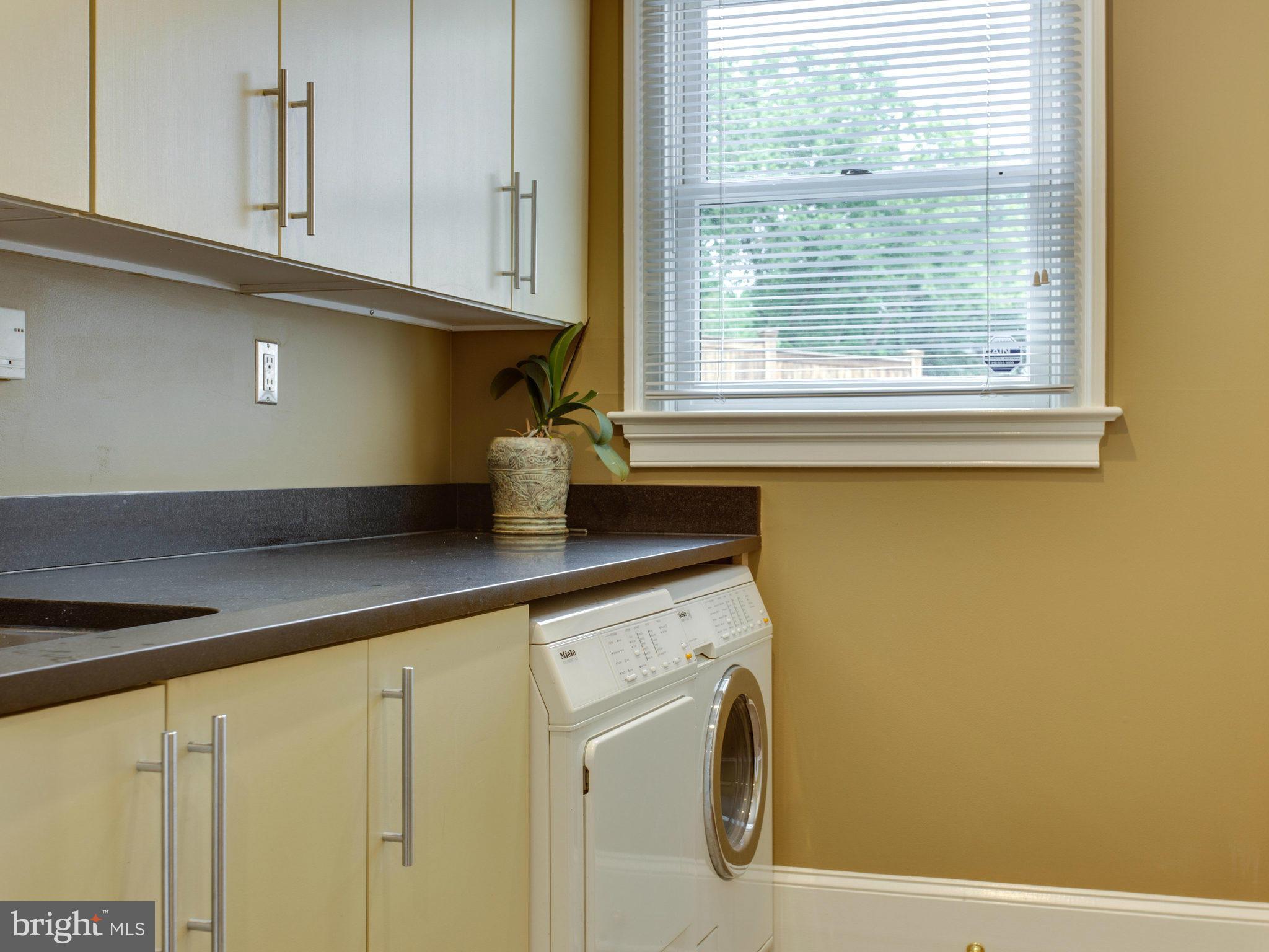 1338 Kirby Road McLean, VA 22101 - Photo 22 of 30 a kitchen with a sink and a window