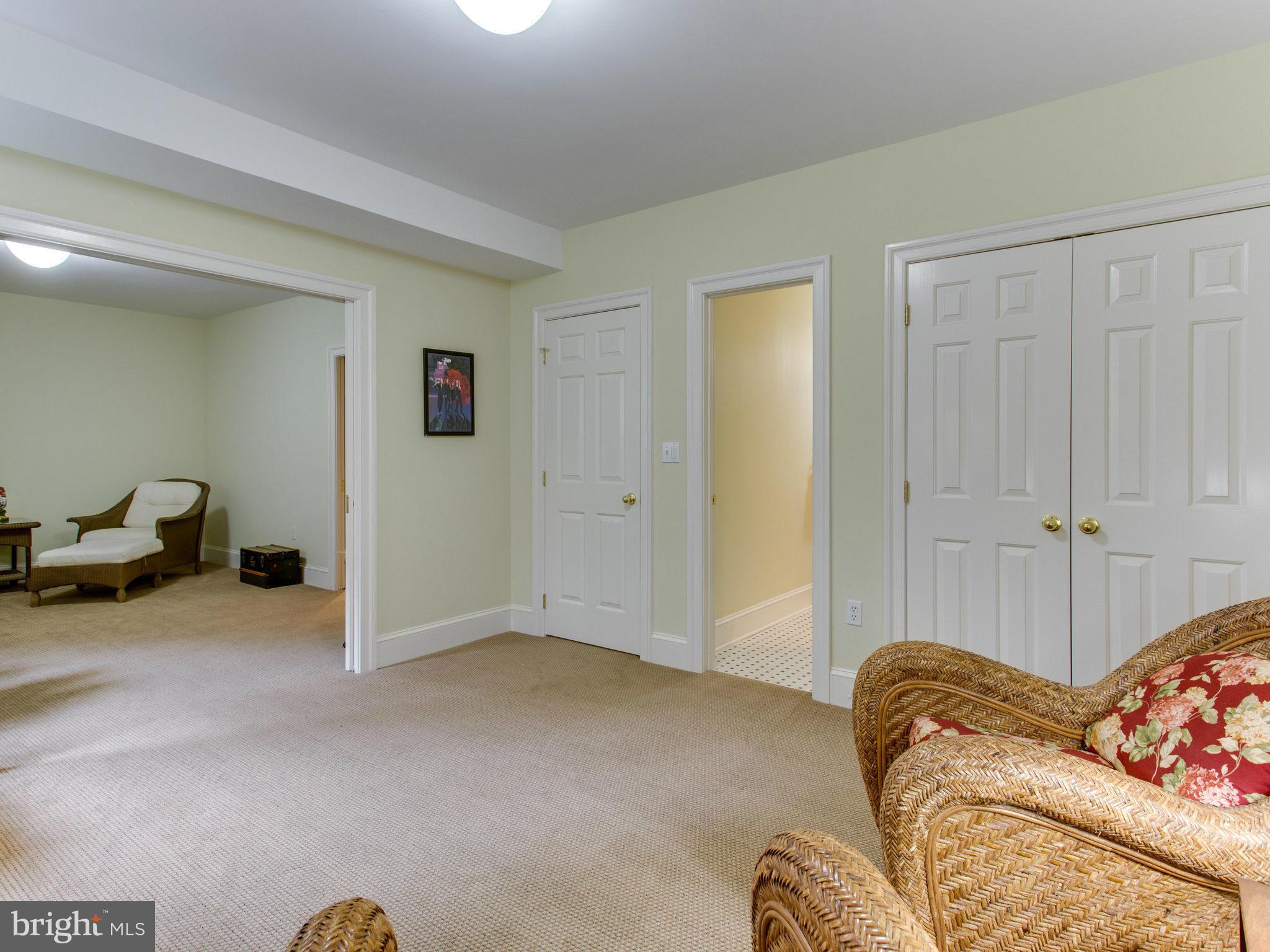 1338 Kirby Road McLean, VA 22101 - Photo 24 of 30 a bed room with a bed and a couch