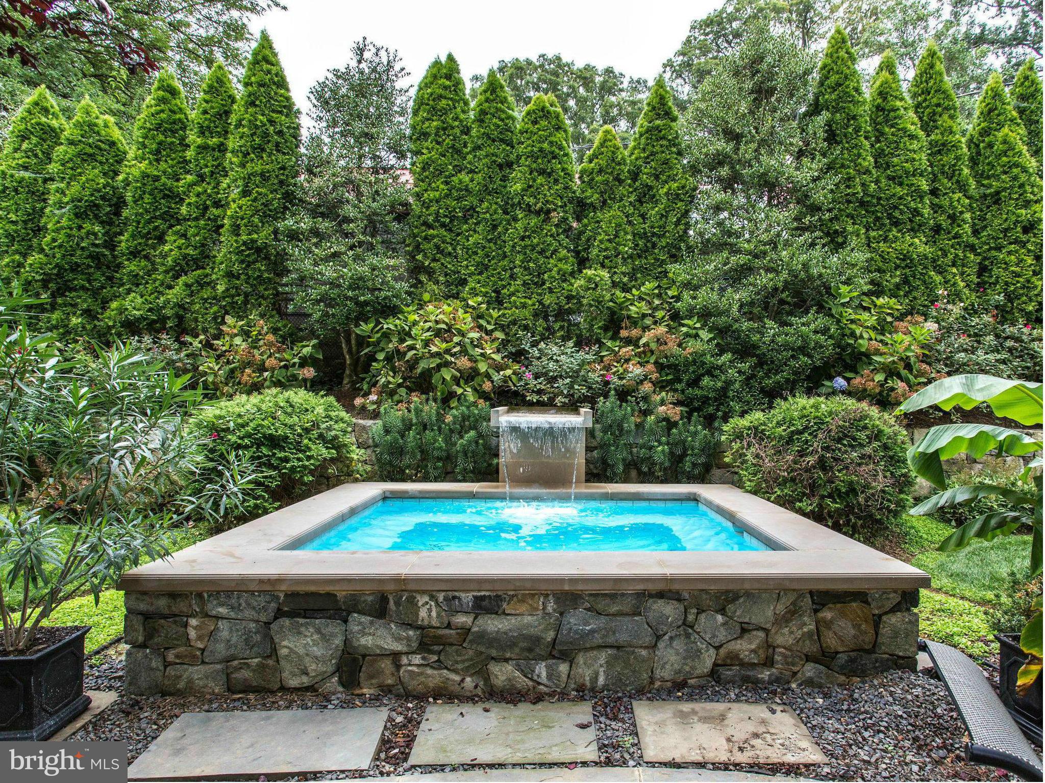1338 Kirby Road McLean, VA 22101 - Photo 29 of 30 a wooden deck with furniture and garden