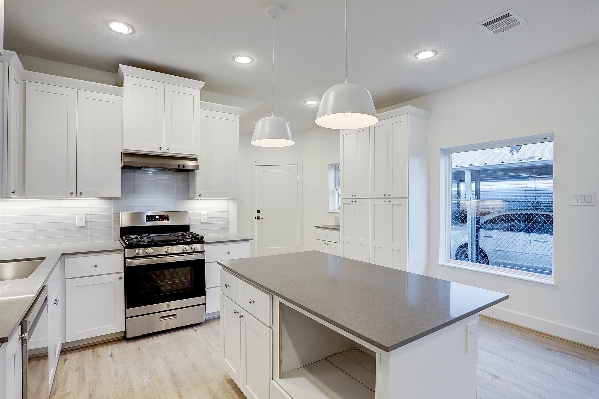 7407 Rusk Street, Unit A Houston, TX 77011 - Photo 5 of 24 Spacious kitchen with ample amount of cabinetry.