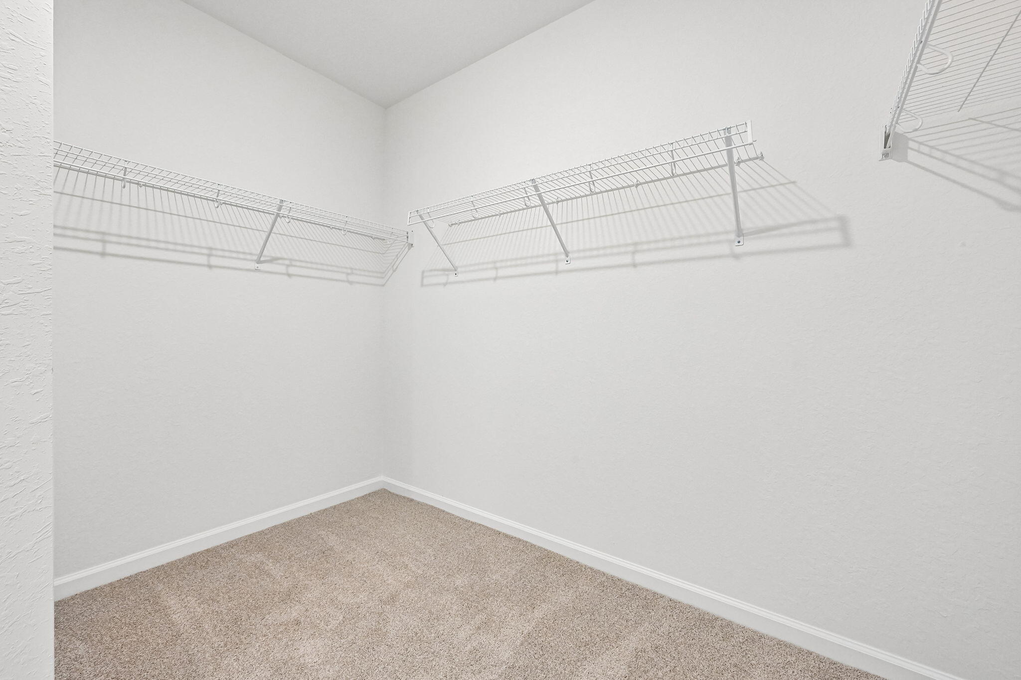 14503 Southwest New Dawn Road Indiantown, FL 34956 - Photo 31 of 42 a view of a room with racks on the wall