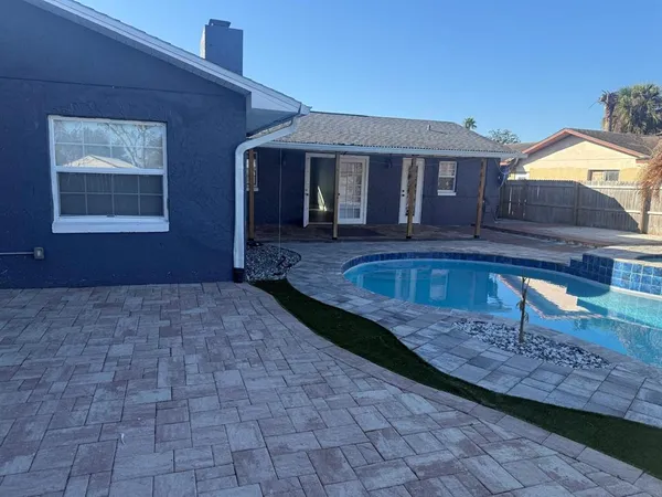a front view of a house with yard