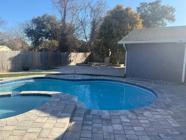 a view of outdoor space yard and swimming pool