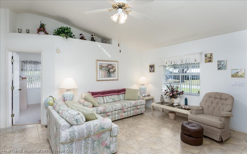4435 Leaf Road Sebring, FL 33875 - Photo 3 of 16 a living room with furniture and a large window