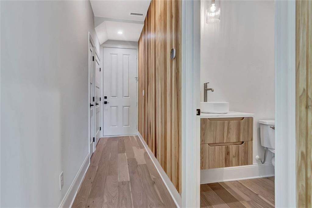 124 Morgan Street Senoia, GA 30276 - Photo 12 of 25 a view of a hallway with wooden floor