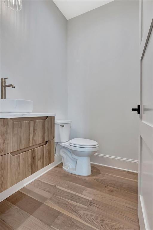 124 Morgan Street Senoia, GA 30276 - Photo 13 of 25 a white toilet sitting next to a white sink