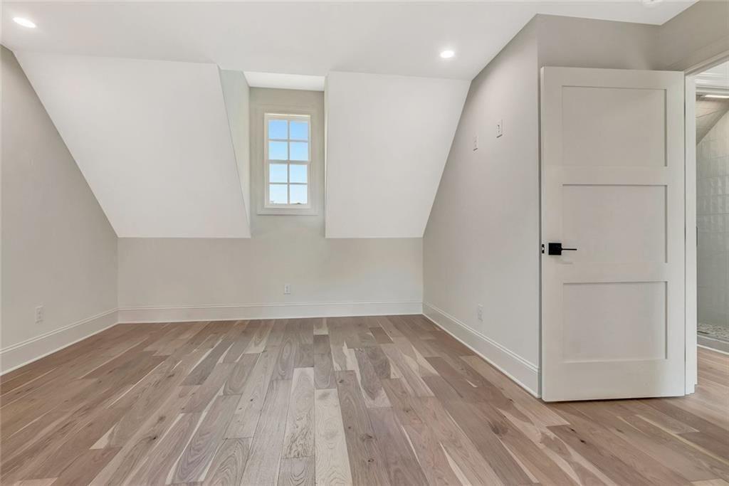 124 Morgan Street Senoia, GA 30276 - Photo 20 of 25 wooden floor in an empty room with a window