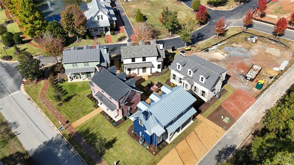 124 Morgan Street Senoia, GA 30276 - Photo 6 of 25 an aerial view of residential house with outdoor space and swimming pool