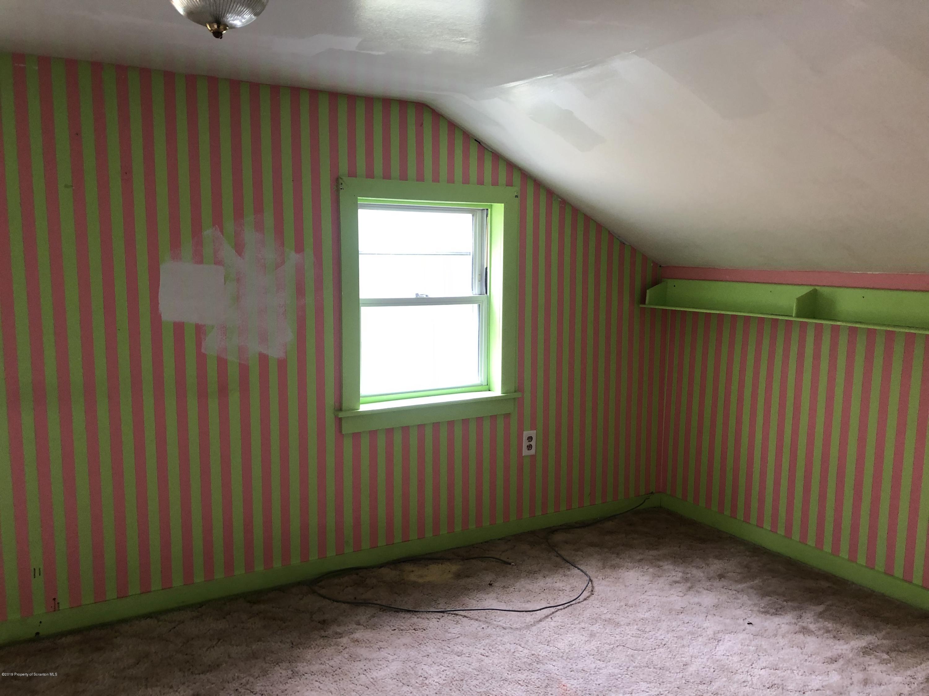 1067 Preacher Brook Road Monroeton, PA 18832 - Photo 15 of 32 an empty room with a window