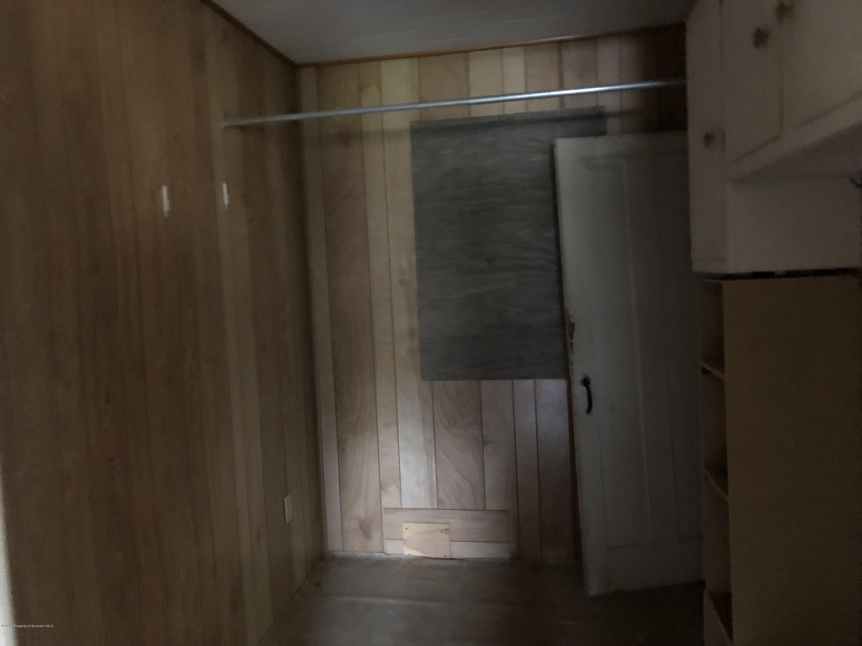 1067 Preacher Brook Road Monroeton, PA 18832 - Photo 6 of 32 a bathroom with a glass door
