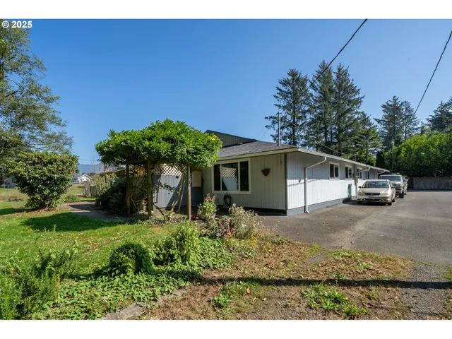 a house with trees in the background