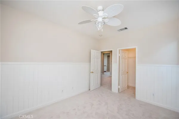 a view of a room with racks on the wall