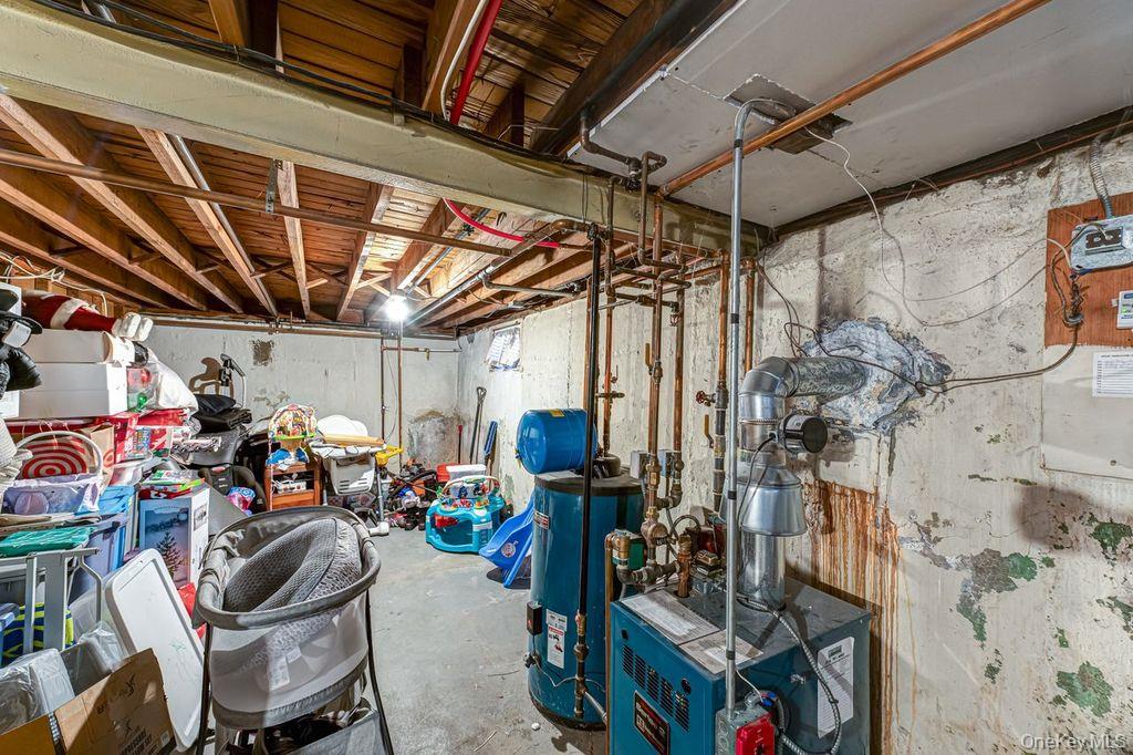 4 Hollyberry Road Plainview, NY 11803 - Photo 15 of 20 a view of a storage room with a lot of stuff