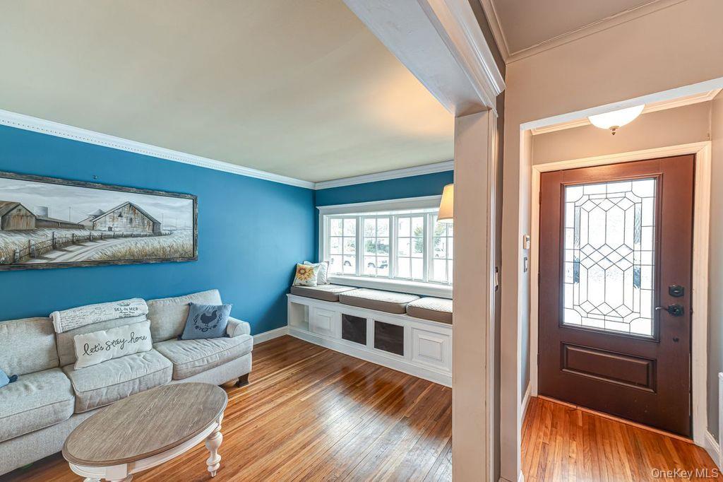 4 Hollyberry Road Plainview, NY 11803 - Photo 3 of 20 a living room with furniture and a window