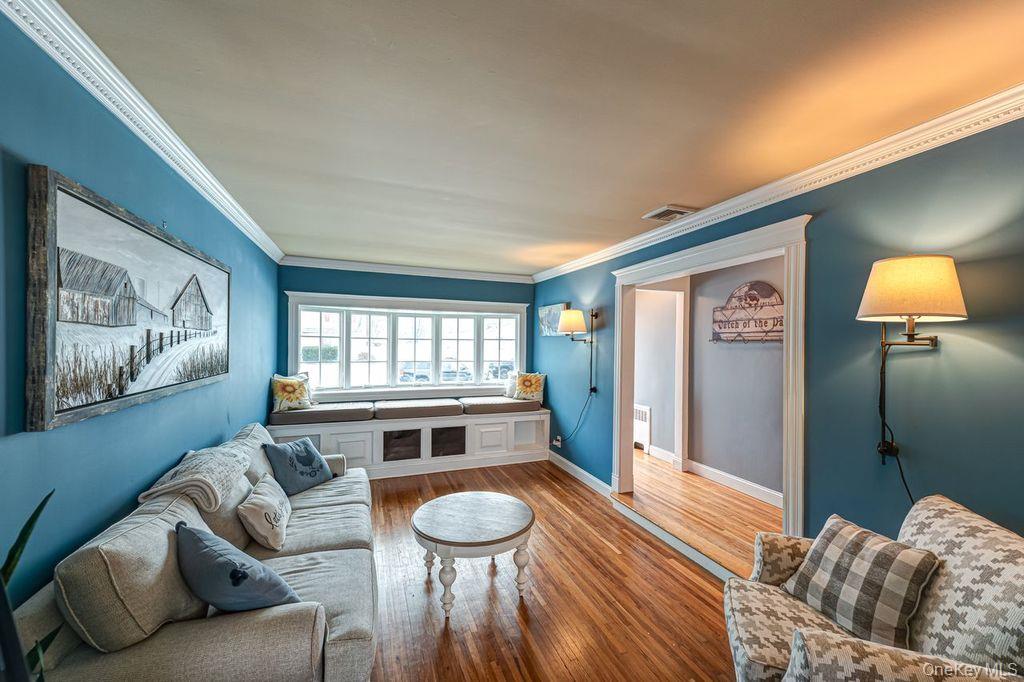 4 Hollyberry Road Plainview, NY 11803 - Photo 4 of 20 a living room with furniture and a large window