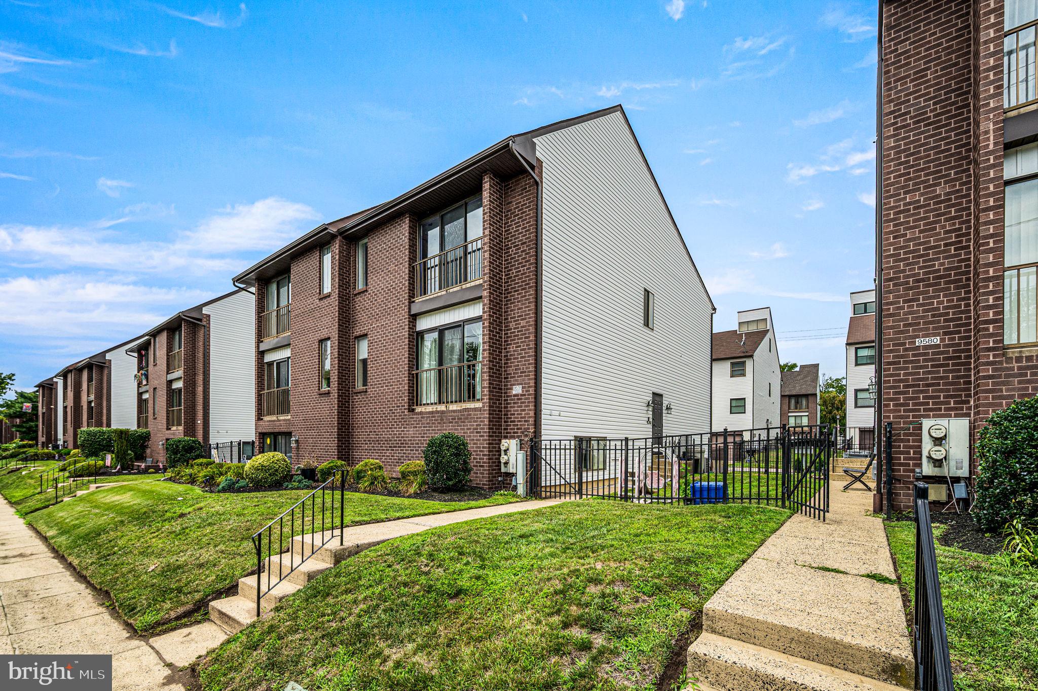 9578 State Rd., Unit A Philadelphia, PA 19114 - Photo 2 of 27 a front view of a house with a yard