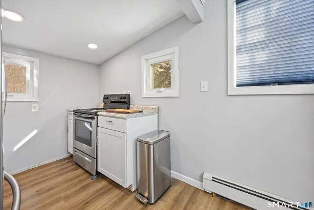 a view of a room with washer and dryer