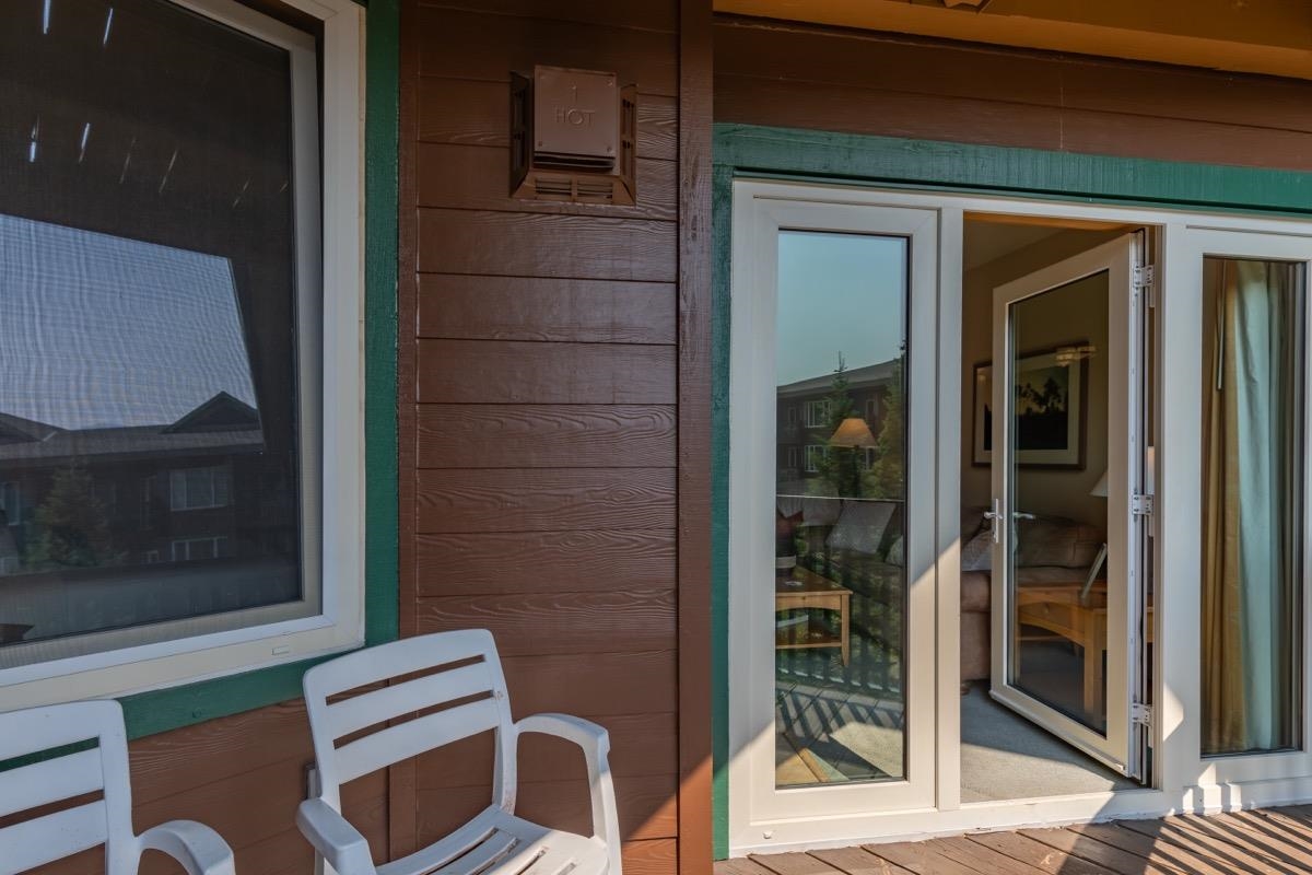 4000 Meridian Boulevard, Unit 436 Mammoth Lakes, CA 93546 - Photo 22 of 46 a view of chair and door in the balcony