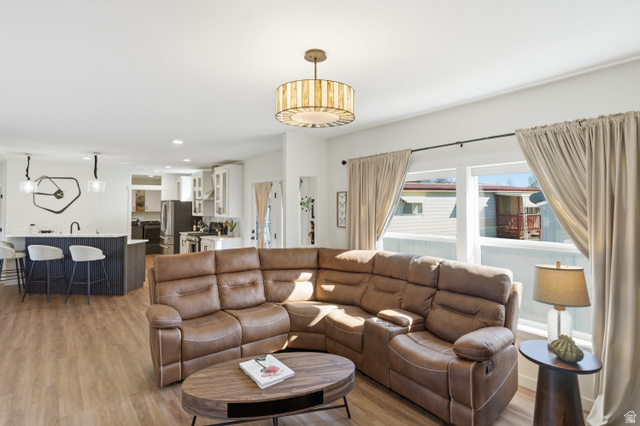 502 West 725 North Logan, UT 84321 - Photo 5 of 25 Living room with light wood finished floors and recessed lighting