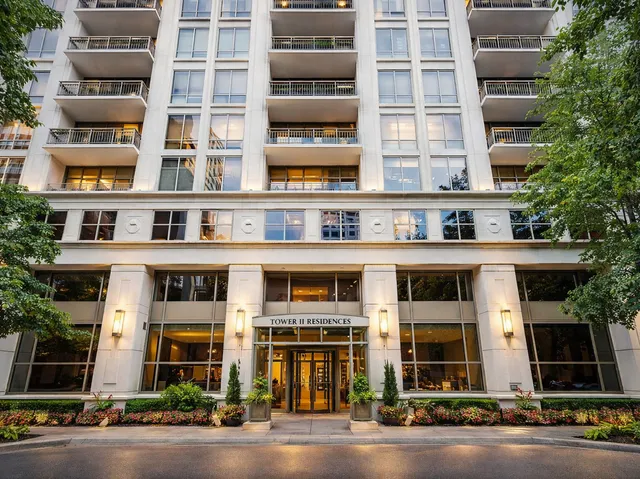 a front view of a building with a street