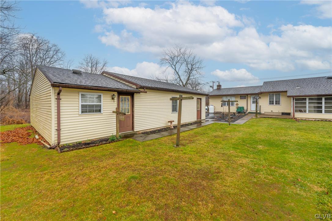 1685 Trexlertown Road Lower Macungie Township, PA 18062 - Photo 11 of 26 a view of a house with a yard